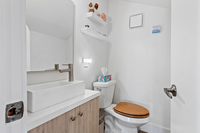 638 NE 8th Ave, Boynton Beach, FL 33435 - bathroom featuring toilet and vanity
