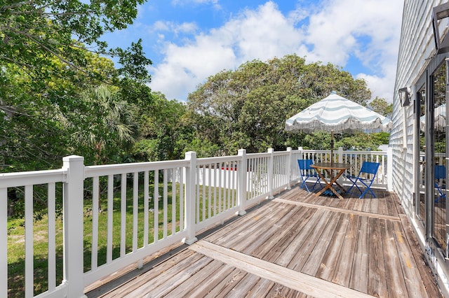 638 NE 8th Ave, Boynton Beach, FL 33435 - wooden terrace featuring outdoor dining space