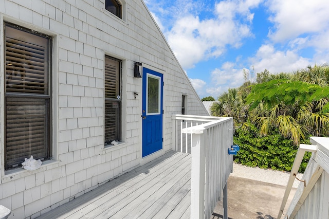 638 NE 8th Ave, Boynton Beach, FL 33435 - view of home's exterior featuring a wooden deck