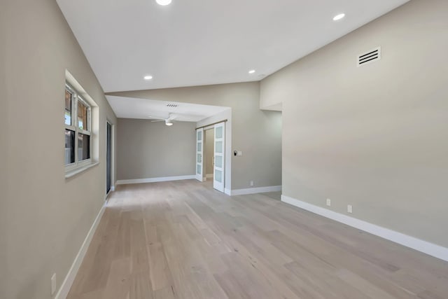 8164 Sweetbriar Way, Boca Raton, FL 33496 - spare room with baseboards, light wood-type flooring, recessed lighting, lofted ceiling, and ceiling fan