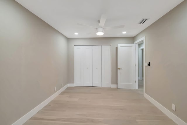 8164 Sweetbriar Way, Boca Raton, FL 33496 - unfurnished bedroom with light wood finished floors, baseboards, recessed lighting, a closet, and a ceiling fan