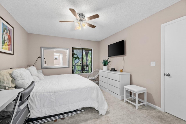 5100 Las Verdes Cir Unit 316, Delray Beach, FL 33484 - bedroom featuring carpet floors, a textured ceiling, and ceiling fan
