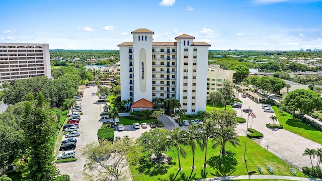 370 Golfview Rd Unit 304, North Palm Beach, FL 33408 - view of apartment building / complex featuring uncovered parking