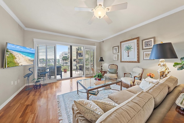 370 Golfview Rd Unit 304, North Palm Beach, FL 33408 - living room with ornamental molding, wood finished floors, ceiling fan, and baseboards