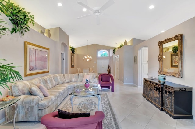 7714 Las Cruces Ct, Boynton Beach, FL 33437 - living area featuring arched walkways, lofted ceiling, ceiling fan, light tile patterned floors, and a chandelier