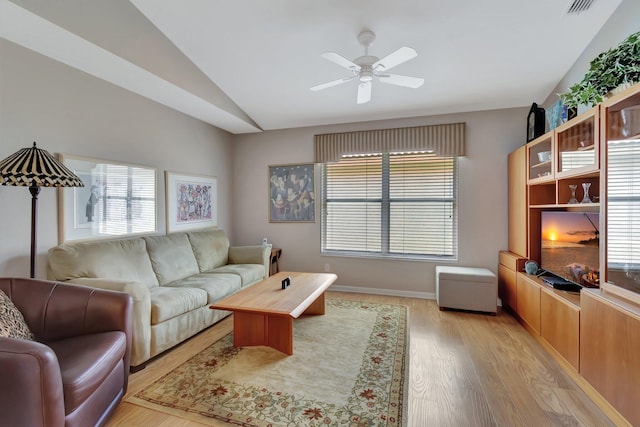 7714 Las Cruces Ct, Boynton Beach, FL 33437 - living room with healthy amount of natural light, lofted ceiling, light wood-style floors, and ceiling fan