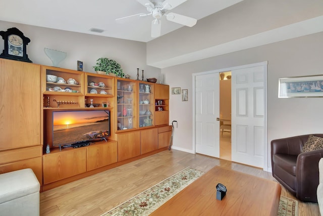 7714 Las Cruces Ct, Boynton Beach, FL 33437 - living room featuring light wood finished floors and ceiling fan