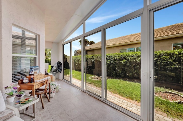 7714 Las Cruces Ct, Boynton Beach, FL 33437 - sunroom / solarium with lofted ceiling and tile patterned floors