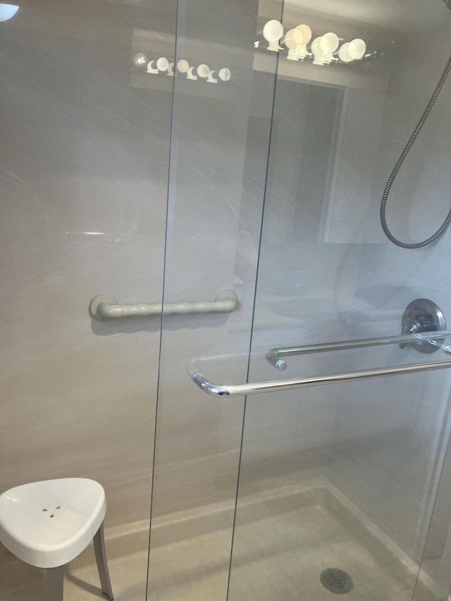 3590 Via Poinciana Unit 303, Lake Worth, FL 33467 - bathroom featuring a tile shower