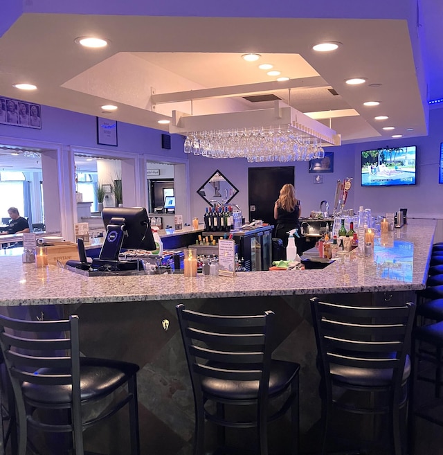 3590 Via Poinciana Unit 303, Lake Worth, FL 33467 - community bar area with a tray ceiling and recessed lighting