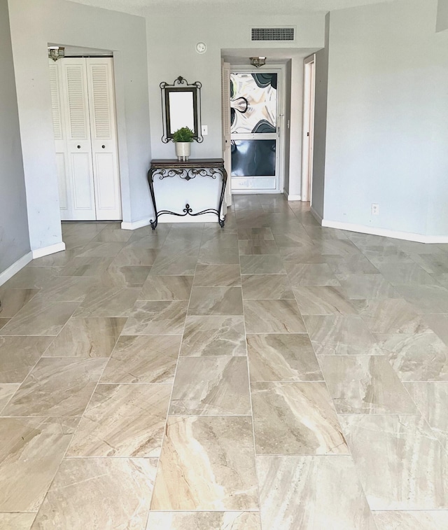 3590 Via Poinciana Unit 303, Lake Worth, FL 33467 - spare room with baseboards