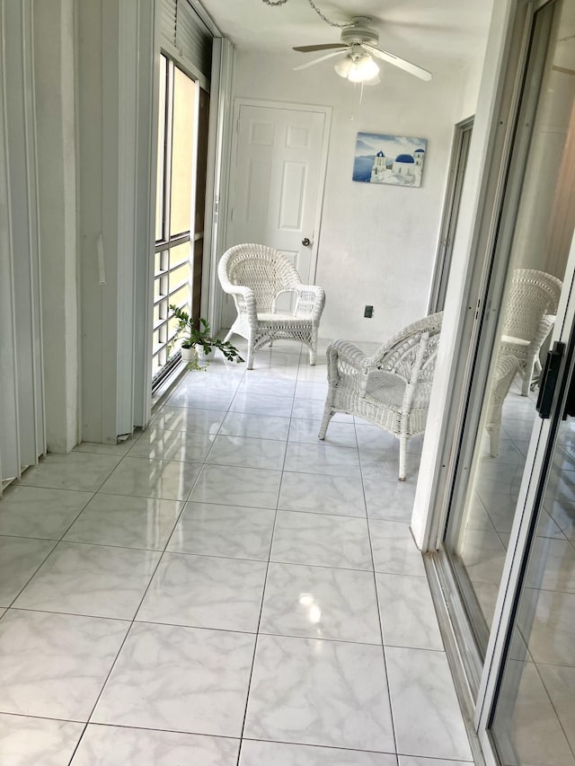 3590 Via Poinciana Unit 303, Lake Worth, FL 33467 - sunroom / solarium with ceiling fan