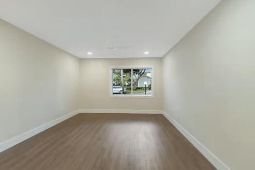 8914 Windtree St, Boca Raton, FL 33496 - empty room with baseboards, wood finished floors, and recessed lighting