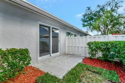 8914 Windtree St, Boca Raton, FL 33496 - view of yard featuring a patio area