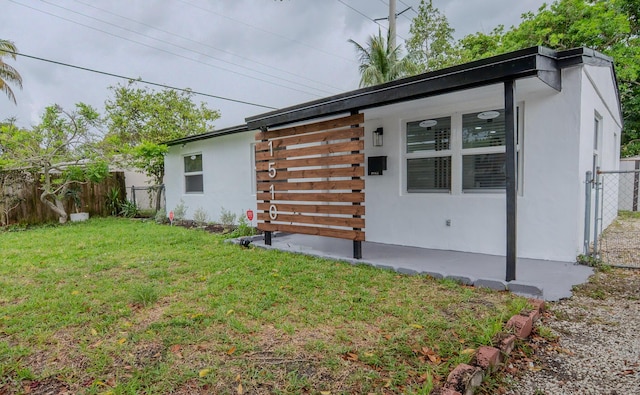 1510 S 23rd Ave, Hollywood, FL 33020 - view of side of home with stucco siding