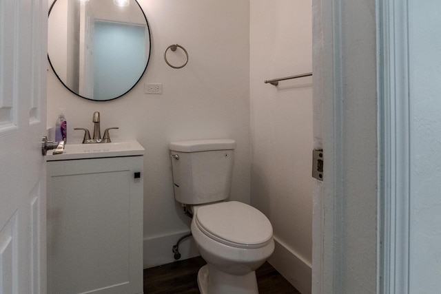 1510 S 23rd Ave, Hollywood, FL 33020 - half bathroom featuring vanity, toilet, and wood finished floors