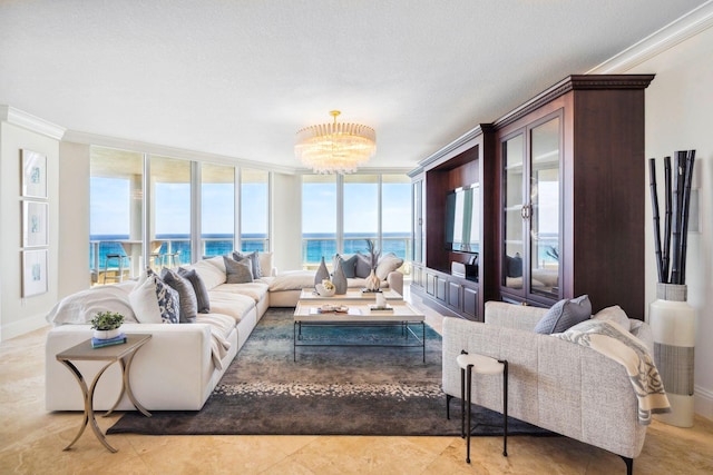 5050 N Ocean Dr Unit 701, Singer Island, FL 33404 - living room featuring ornamental molding, a chandelier, baseboards, and floor to ceiling windows