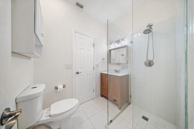 7903 Plantation Lakes Dr NW, Port Saint Lucie, FL 34986 - bathroom with a stall shower, toilet, vanity, and tile patterned floors