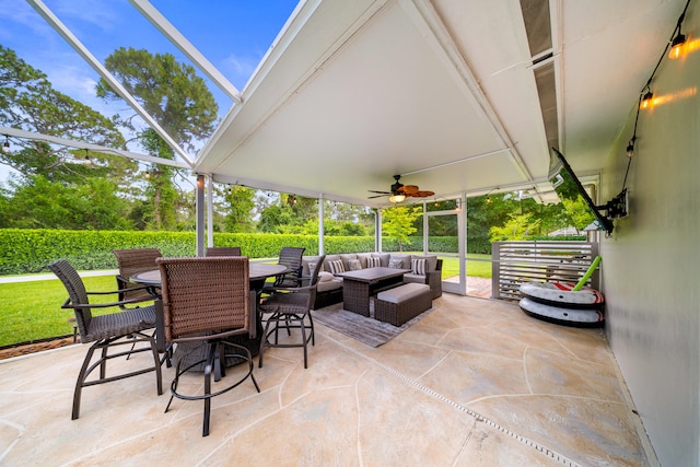 7903 Plantation Lakes Dr NW, Port Saint Lucie, FL 34986 - view of patio featuring ceiling fan, outdoor dining space, and an outdoor living space