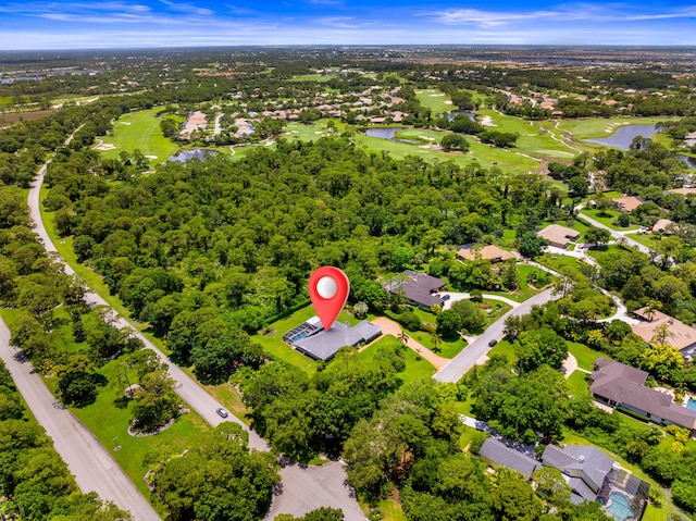 7903 Plantation Lakes Dr NW, Port Saint Lucie, FL 34986 - aerial view of property's location featuring a large body of water, a golf club, and nearby suburban area