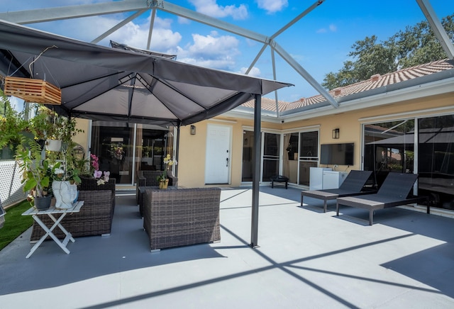9132 Sun Terrace Cir Unit D, Palm Beach Gardens, FL 33403 - view of patio / terrace featuring glass enclosure and an outdoor hangout area