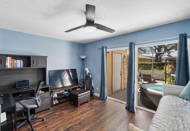 9132 Sun Terrace Cir Unit D, Palm Beach Gardens, FL 33403 - home office with dark wood finished floors, a textured ceiling, a ceiling fan, and baseboards