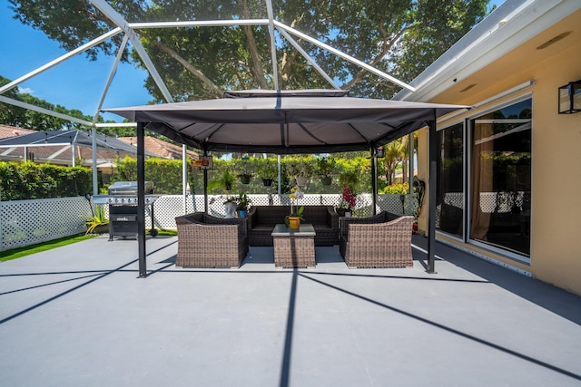 9132 Sun Terrace Cir Unit D, Palm Beach Gardens, FL 33403 - view of patio with an outdoor living space, glass enclosure, and grilling area