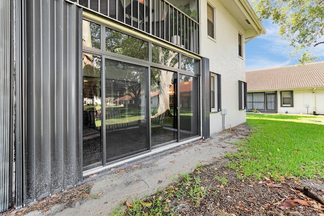 9628 Pavarotti Ter Unit 101, Boynton Beach, FL 33437 - view of exterior entry featuring stucco siding