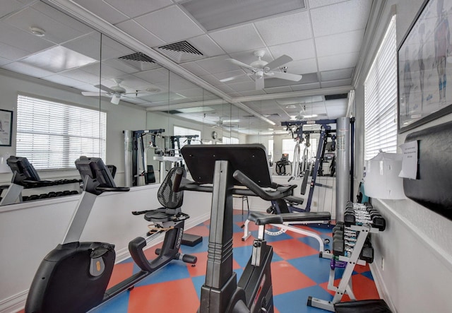 9628 Pavarotti Ter Unit 101, Boynton Beach, FL 33437 - exercise room with ceiling fan, a drop ceiling, and plenty of natural light