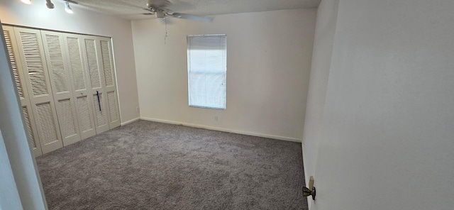 8205 Winnipesaukee Way, Lake Worth, FL 33467 - unfurnished bedroom featuring carpet floors, a closet, and a ceiling fan