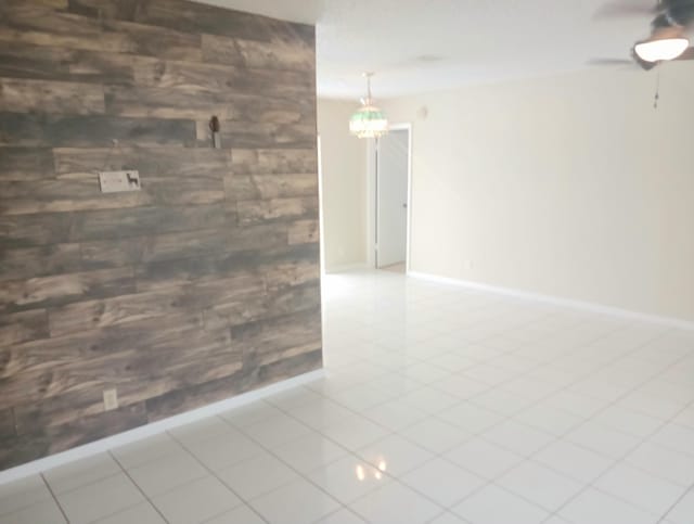8205 Winnipesaukee Way, Lake Worth, FL 33467 - spare room featuring baseboards and ceiling fan
