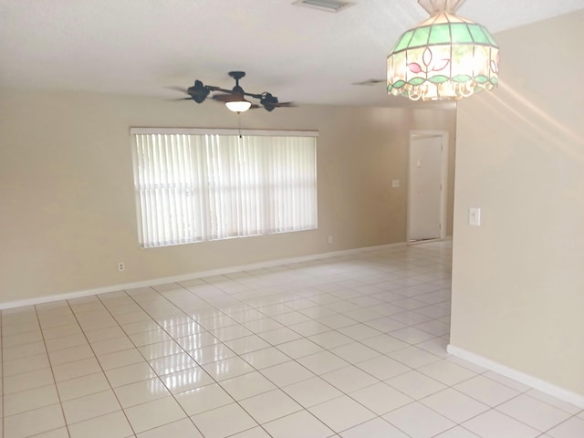8205 Winnipesaukee Way, Lake Worth, FL 33467 - empty room with light tile patterned floors and baseboards