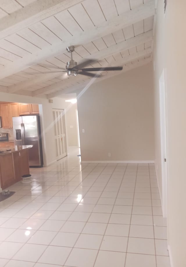 8205 Winnipesaukee Way, Lake Worth, FL 33467 - spare room with light tile patterned flooring, a ceiling fan, beam ceiling, and baseboards