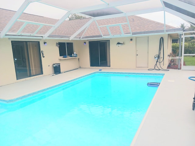 8205 Winnipesaukee Way, Lake Worth, FL 33467 - swimming pool with a patio and glass enclosure