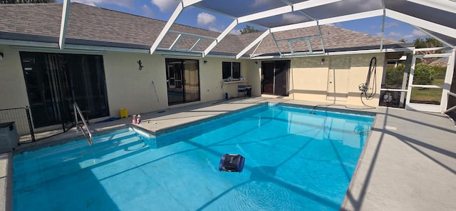 8205 Winnipesaukee Way, Lake Worth, FL 33467 - outdoor pool with a lanai and a patio area