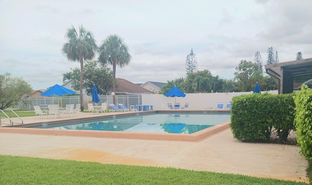 8205 Winnipesaukee Way, Lake Worth, FL 33467 - community pool with a patio