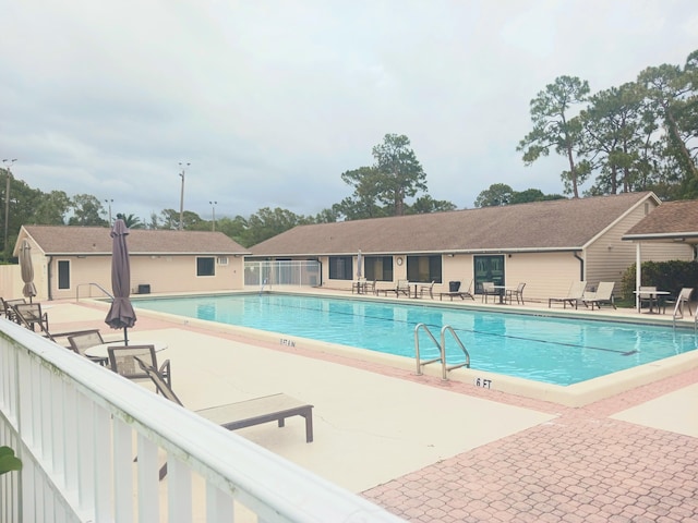 8205 Winnipesaukee Way, Lake Worth, FL 33467 - community pool featuring a patio