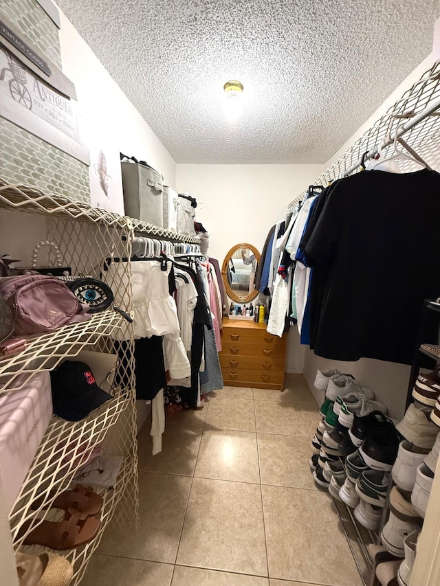 709 Lori Dr Unit 301, Palm Springs, FL 33461 - walk in closet featuring tile patterned flooring