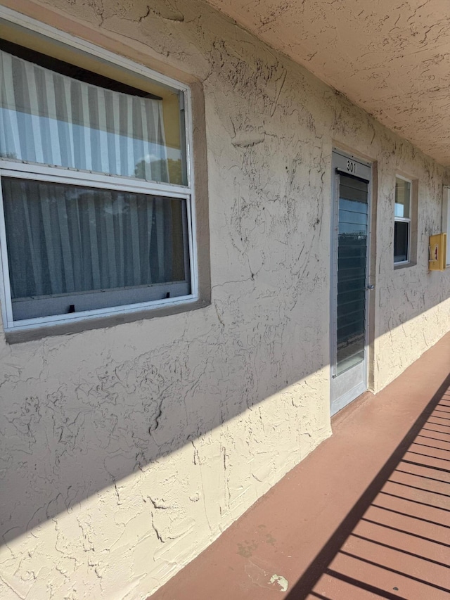 709 Lori Dr Unit 301, Palm Springs, FL 33461 - exterior view of stucco siding
