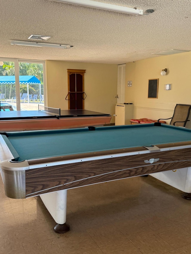 709 Lori Dr Unit 301, Palm Springs, FL 33461 - game room featuring pool table, a textured ceiling, and tile patterned floors