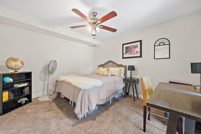 506 5th Ter, Palm Beach Gardens, FL 33418 - carpeted bedroom featuring baseboards and a ceiling fan