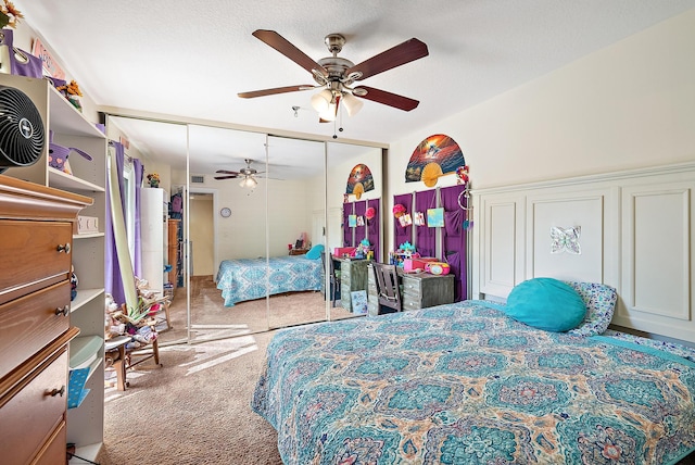 506 5th Ter, Palm Beach Gardens, FL 33418 - bedroom featuring carpet floors, a closet, and a ceiling fan