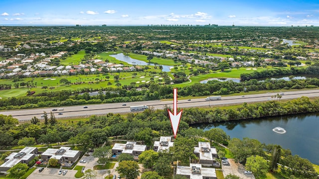 506 5th Ter, Palm Beach Gardens, FL 33418 - aerial overview of property's location featuring a large body of water, a local golf course, and nearby suburban area