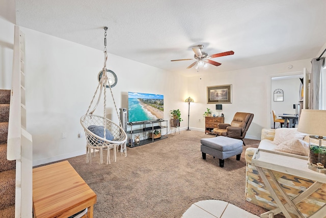 506 5th Ter, Palm Beach Gardens, FL 33418 - carpeted living room featuring ceiling fan, stairs, and baseboards