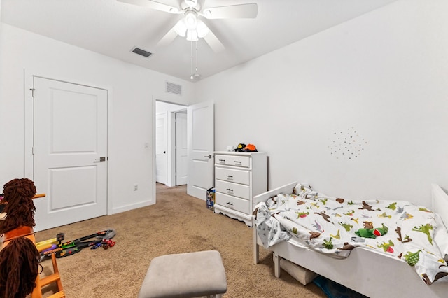 6143 Wildfire Way, West Palm Beach, FL 33415 - bedroom with light colored carpet, a ceiling fan, and baseboards