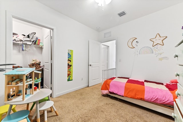 6143 Wildfire Way, West Palm Beach, FL 33415 - bedroom with carpet, a closet, and baseboards