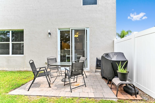 6143 Wildfire Way, West Palm Beach, FL 33415 - view of patio / terrace featuring outdoor dining area and a grill