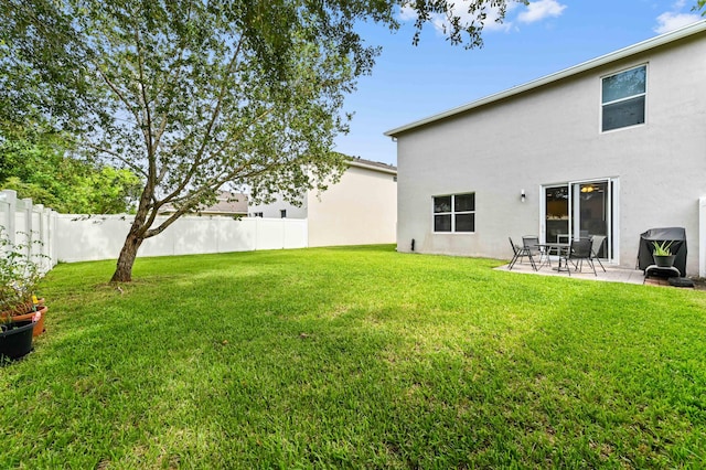 6143 Wildfire Way, West Palm Beach, FL 33415 - view of yard with a patio