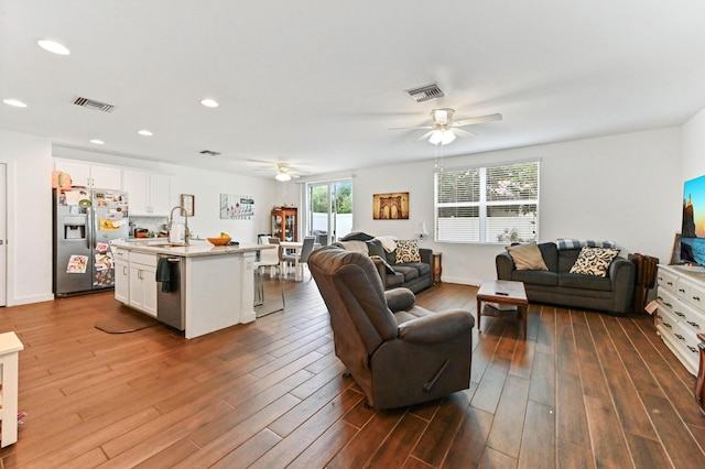 6143 Wildfire Way, West Palm Beach, FL 33415 - living area with ceiling fan, dark wood-style floors, and recessed lighting
