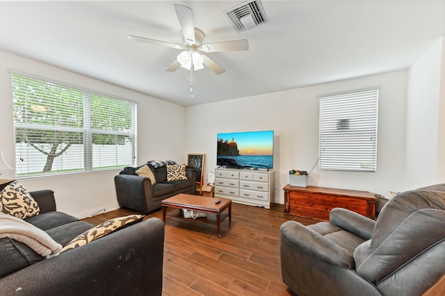 6143 Wildfire Way, West Palm Beach, FL 33415 - living area with dark wood-style floors, a ceiling fan, and baseboards